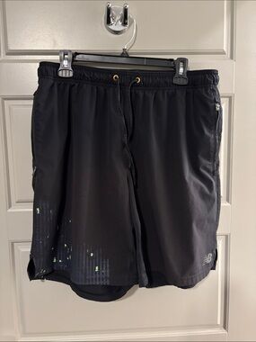 New Balance Black Athletic Shorts with Green Pixel Accent